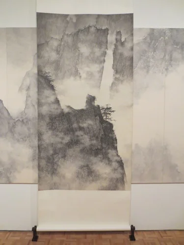 Scroll in "Dragons Amidst Mountain Ridge" (2006-9), by Li Huayi.
