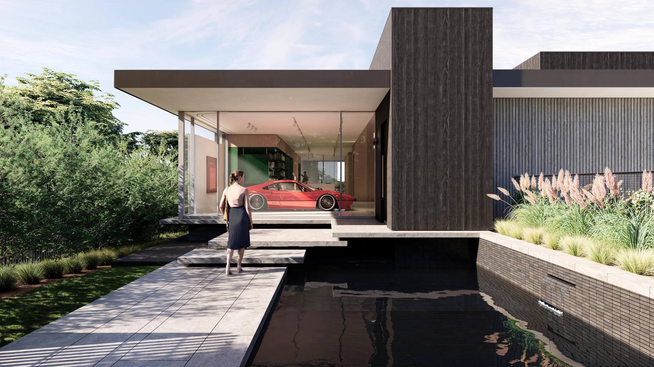 Glass and shou sugi ban clad house with car in the glass window of a cantilevered room.