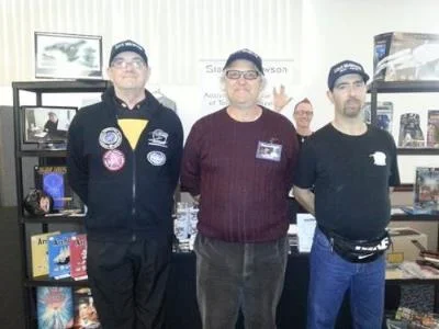 September 15, Club members - Roy, George, Rob and a cheeky Vulcan salute from Stu in the background at our expo area at the Star Trek - Buck Rogers convention in Adelaide.