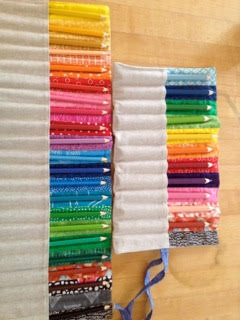 Colorful pencil rolls are a perfect way to use up small pieces in your stash! Loving the ROYGBIV.