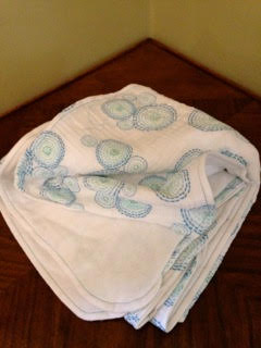 Super cozy, and quick to make, swaddle blanket with double gauze and flannel.