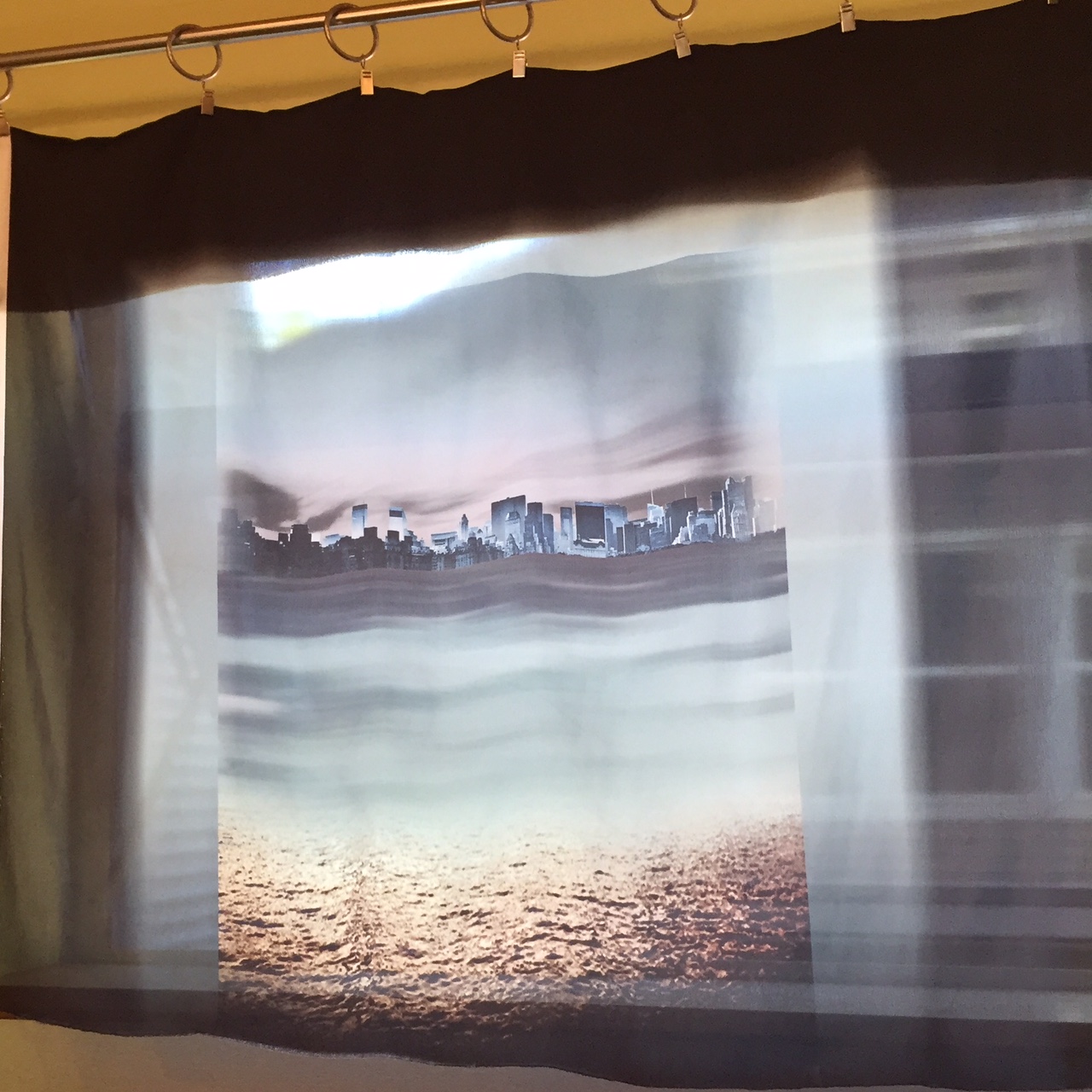 Tricky to photo, this super sheer, super cool city scene panel is currently being shown off in our back window. This is a great piece to ignite the imagination!