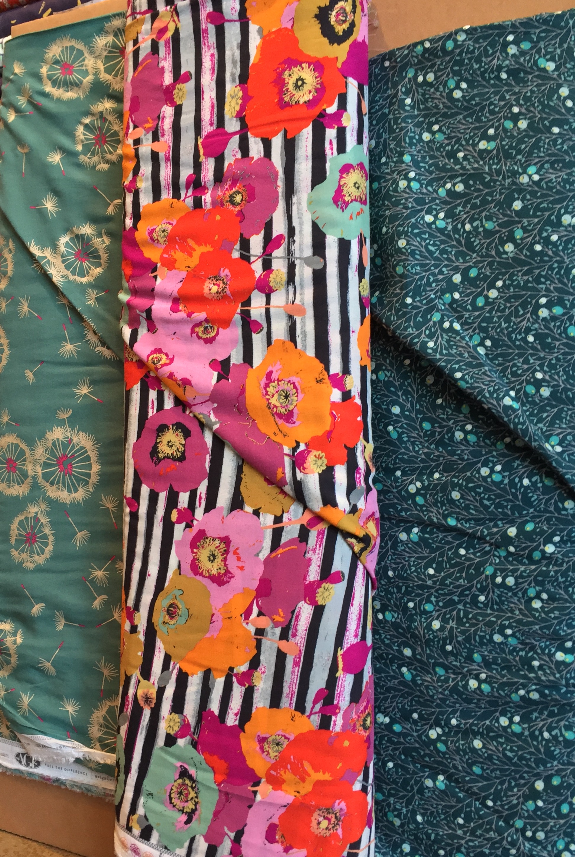 Lovely stretch cotton in a summery, light weight with metallic accents, and two luscious rayons.