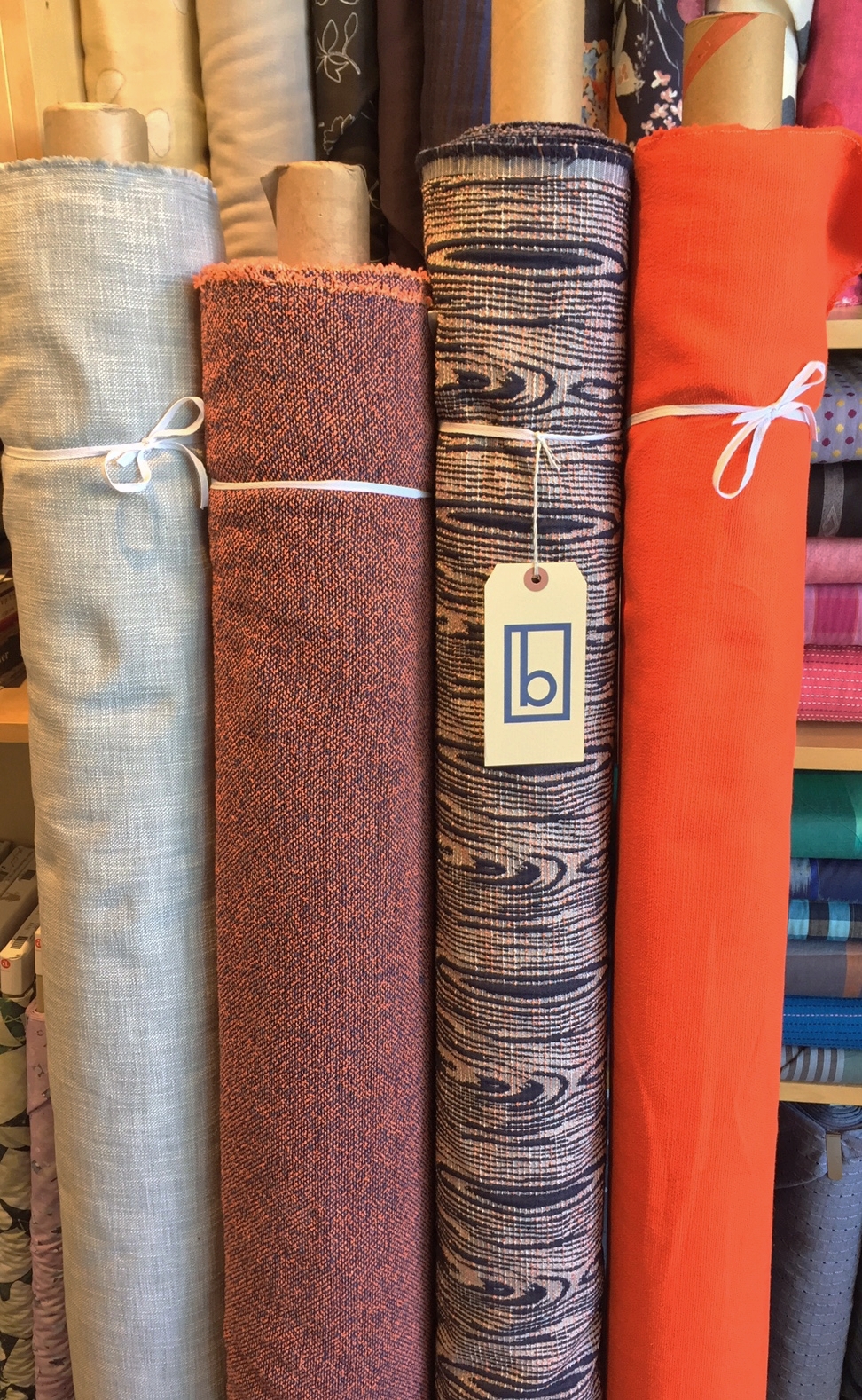 Textured cotton solids, cotton boucle, cotton jacquard.