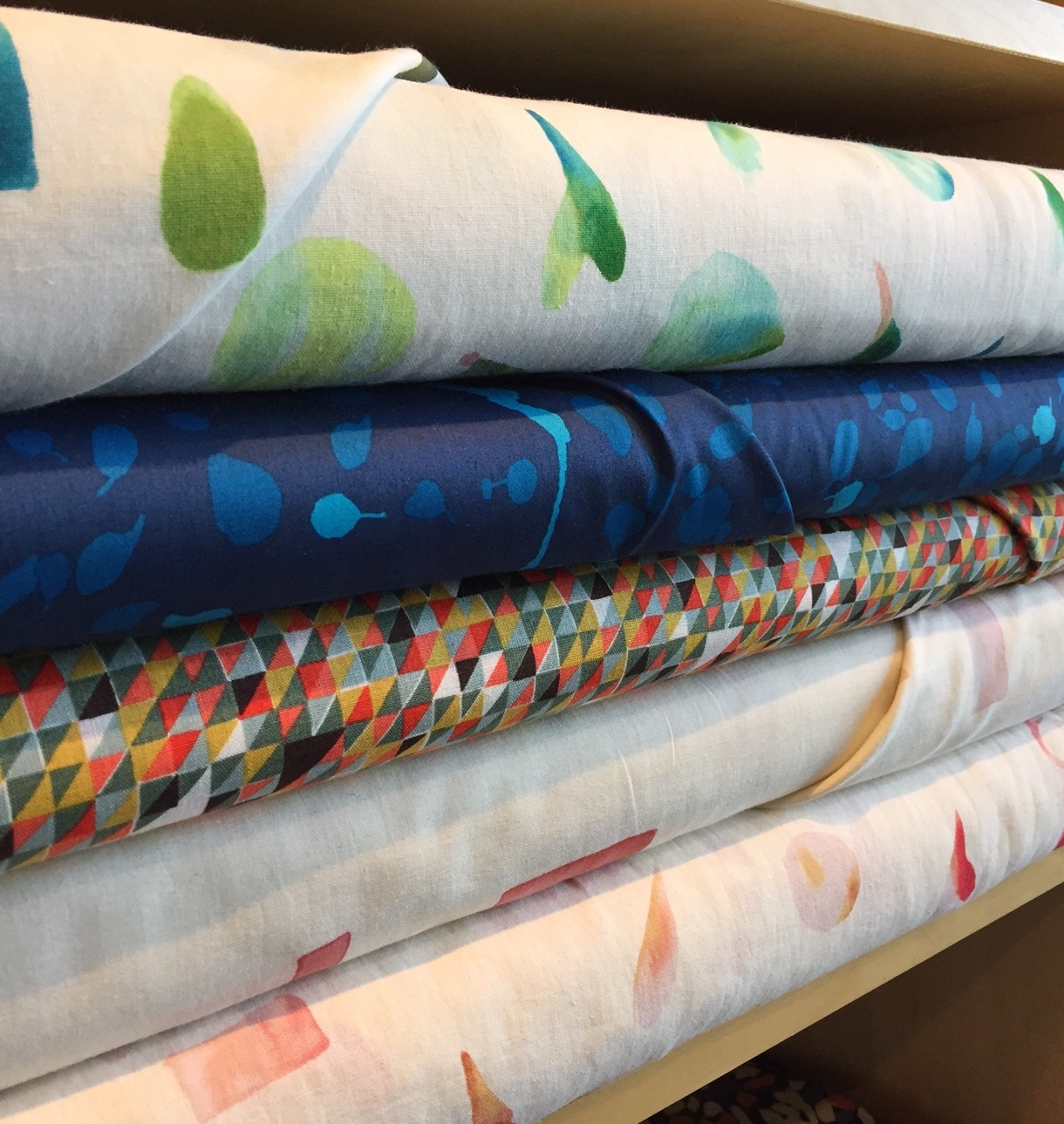 More shirtings from 3 Mins. (top and bottom), inky blue on cotton, and triangles on a lightweight cotton/linen blend.