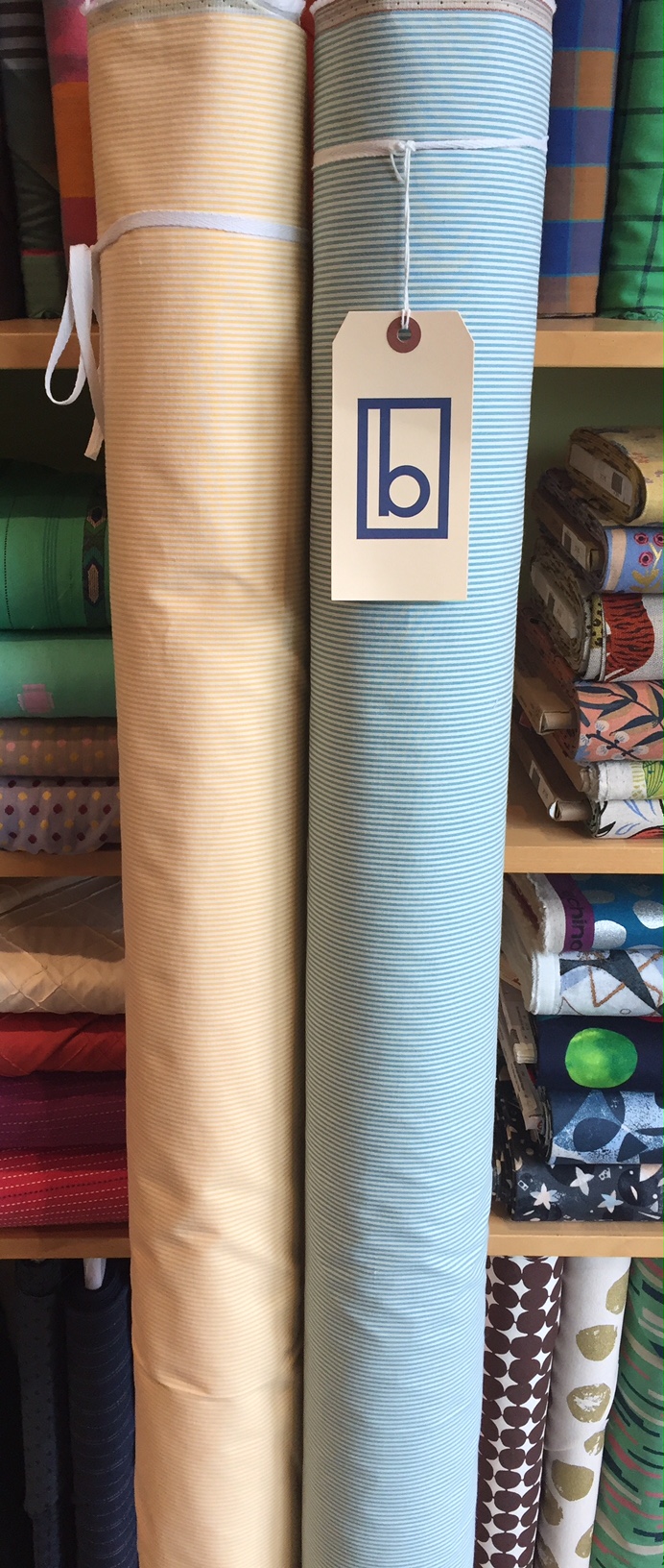 Cotton stretch pin cord suiting in two spring-summer colors.
