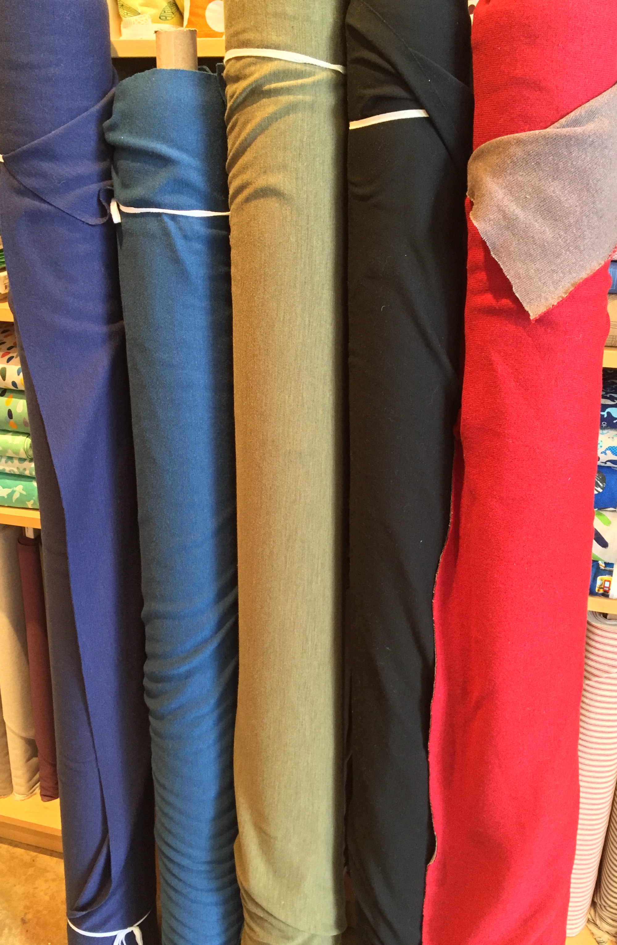 Knit wool blends, including ponte (the blues on the left) and double faced (on the right).