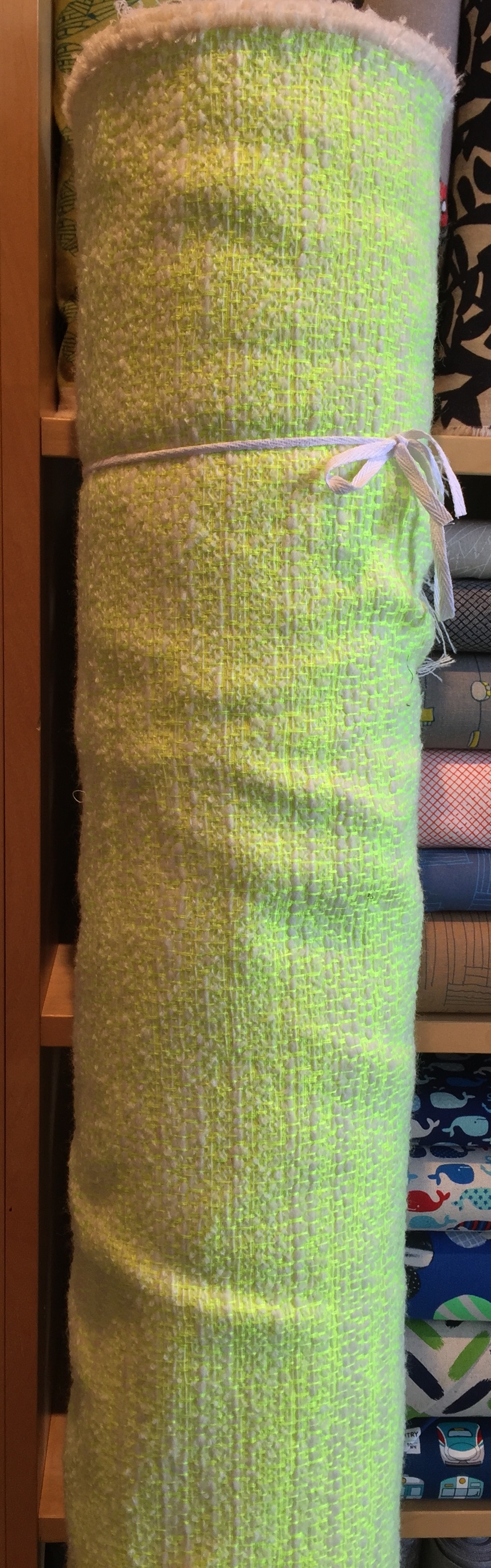 This whacky neon stitched white wool is one of my current absolute faves in the store. I'm hoping there's some left for me after the sale!