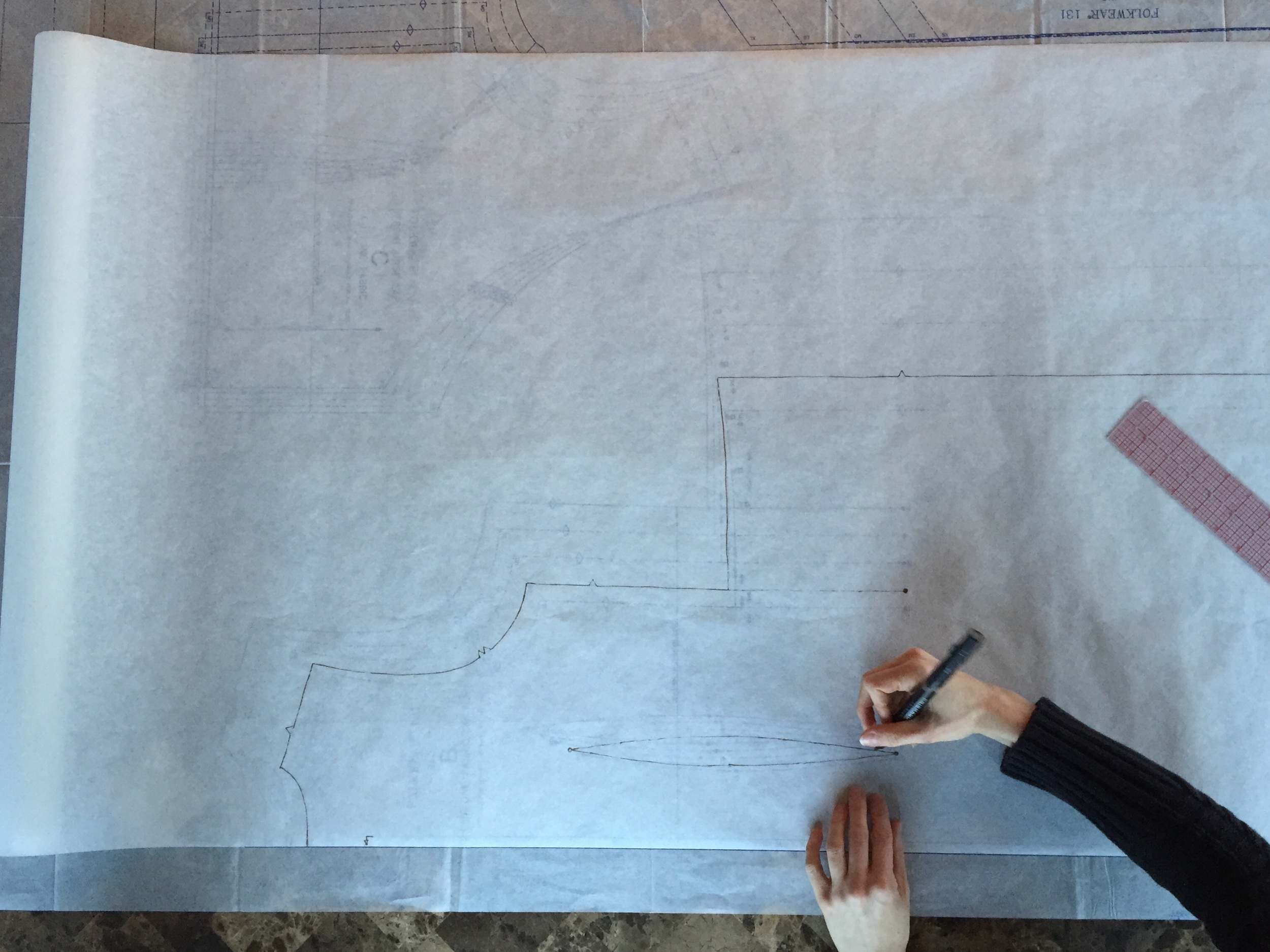 Sarah's beautiful hands preparing a Folkwear sample.