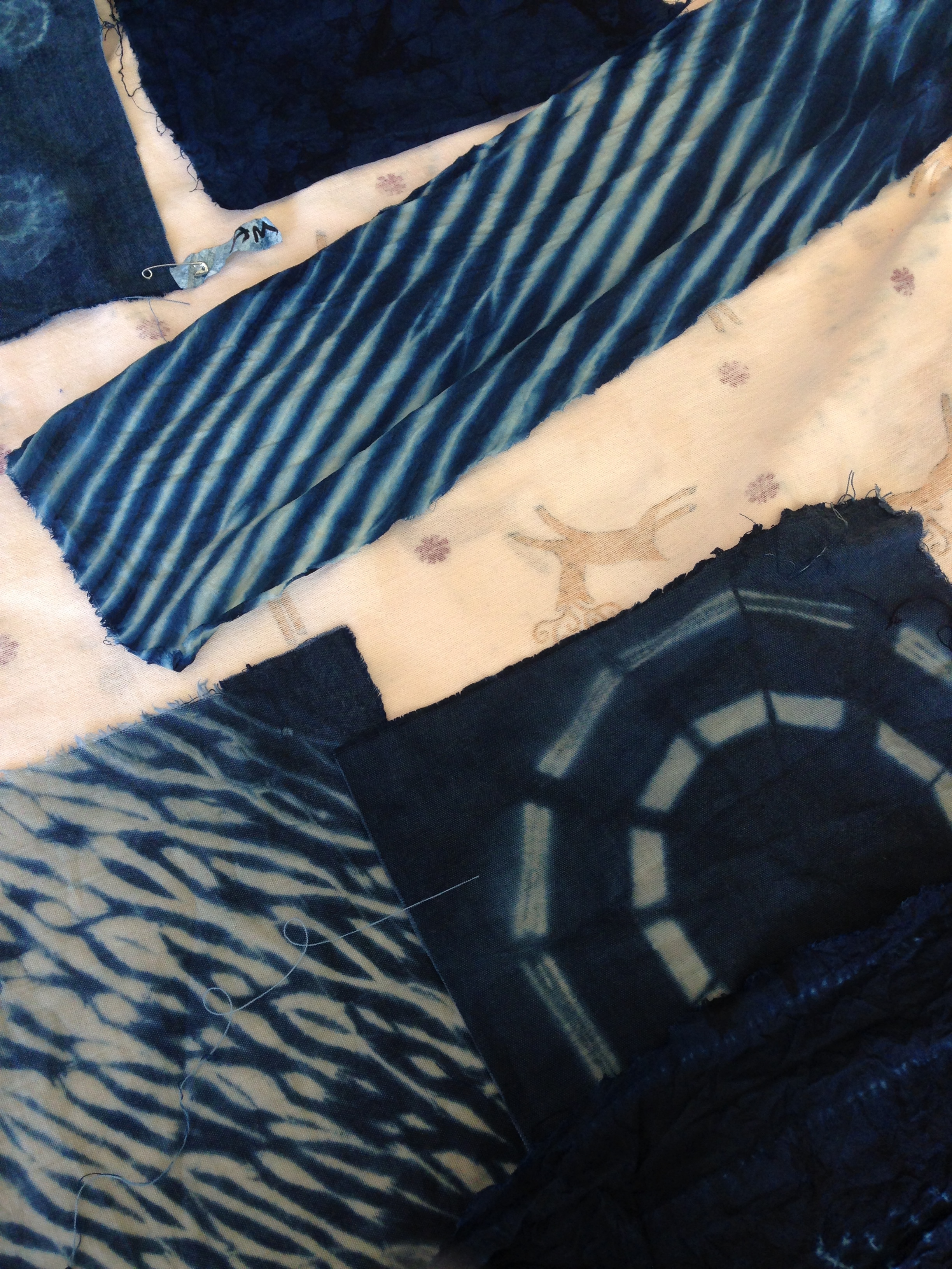 Student work drying at the Shibori scarf workshop
