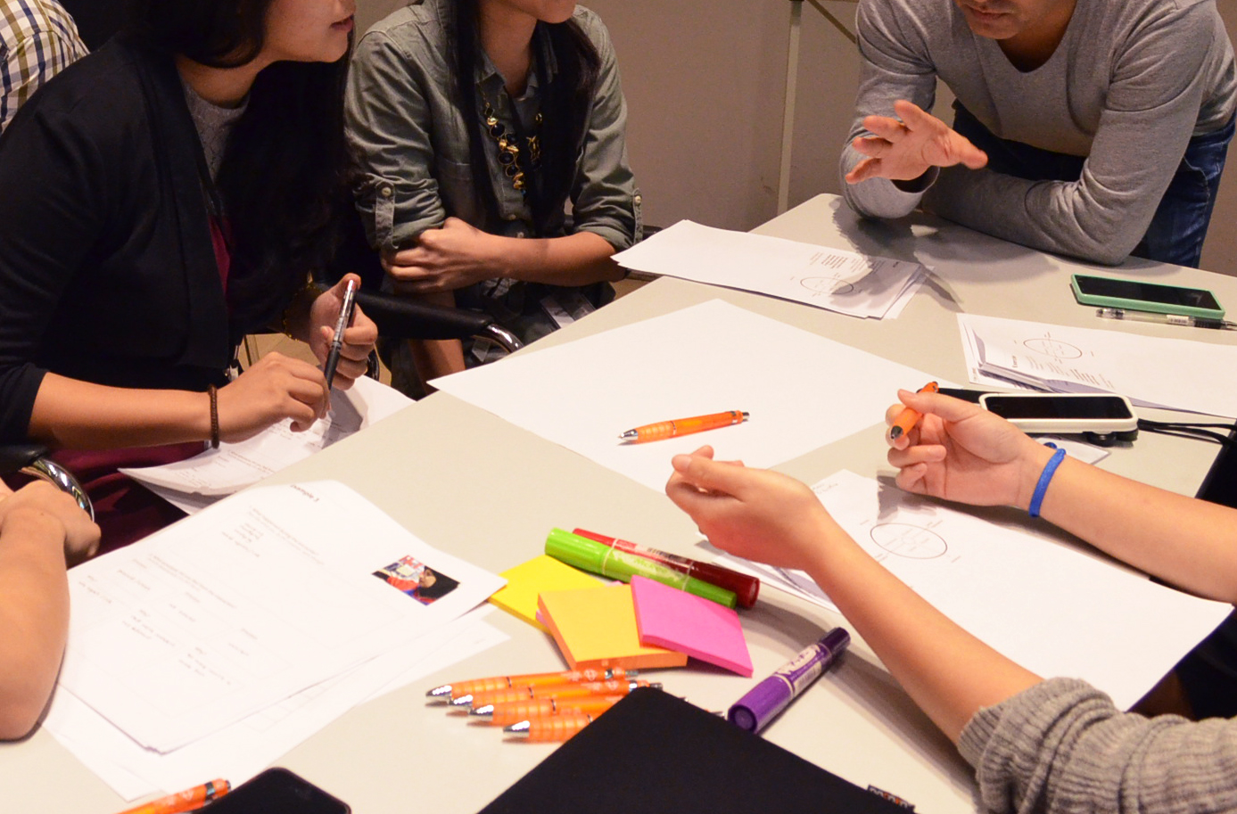 Our facilitator sharing user insights before an exercise during one of the workshops sessions