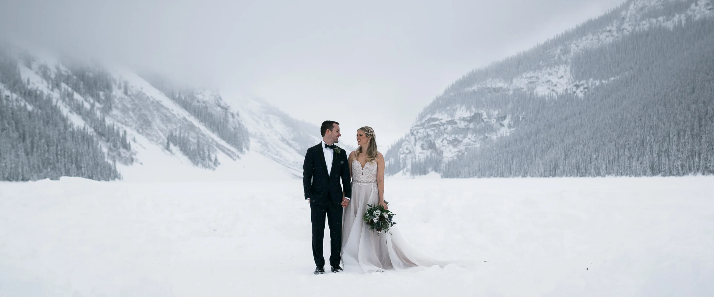 Genis + Luke's Snowy Lake Louise Wedding