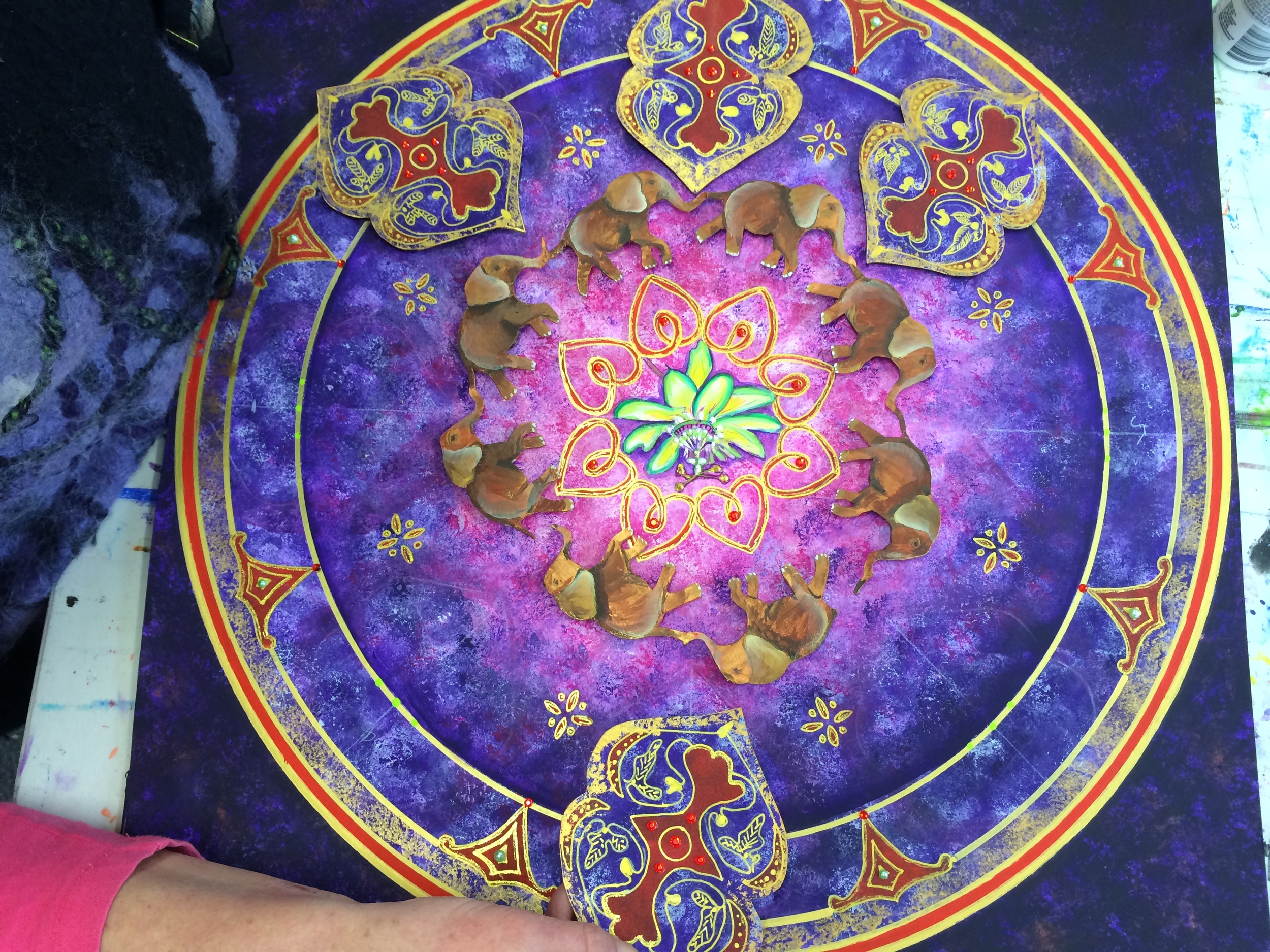 Tiffany working on a mandala
