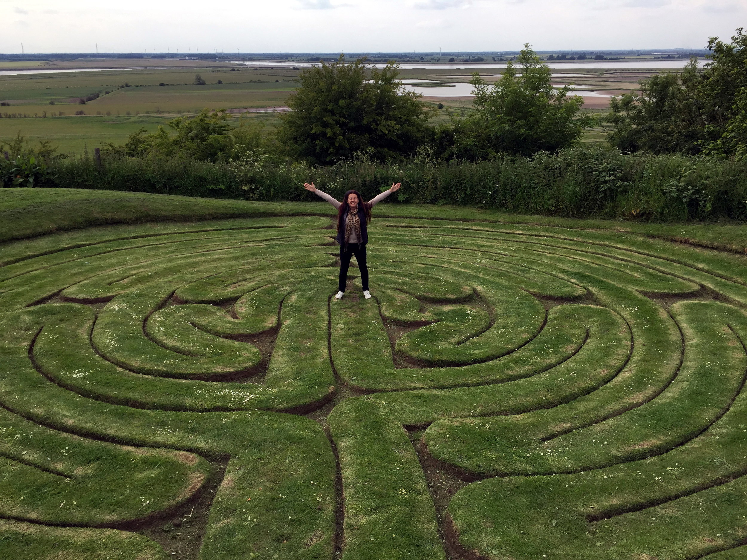 turf maze, UK maintained by villiagers for centuries.