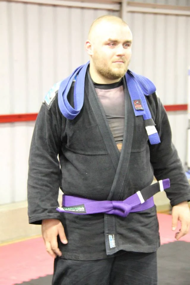 Kieryn in his new Purple Belt.