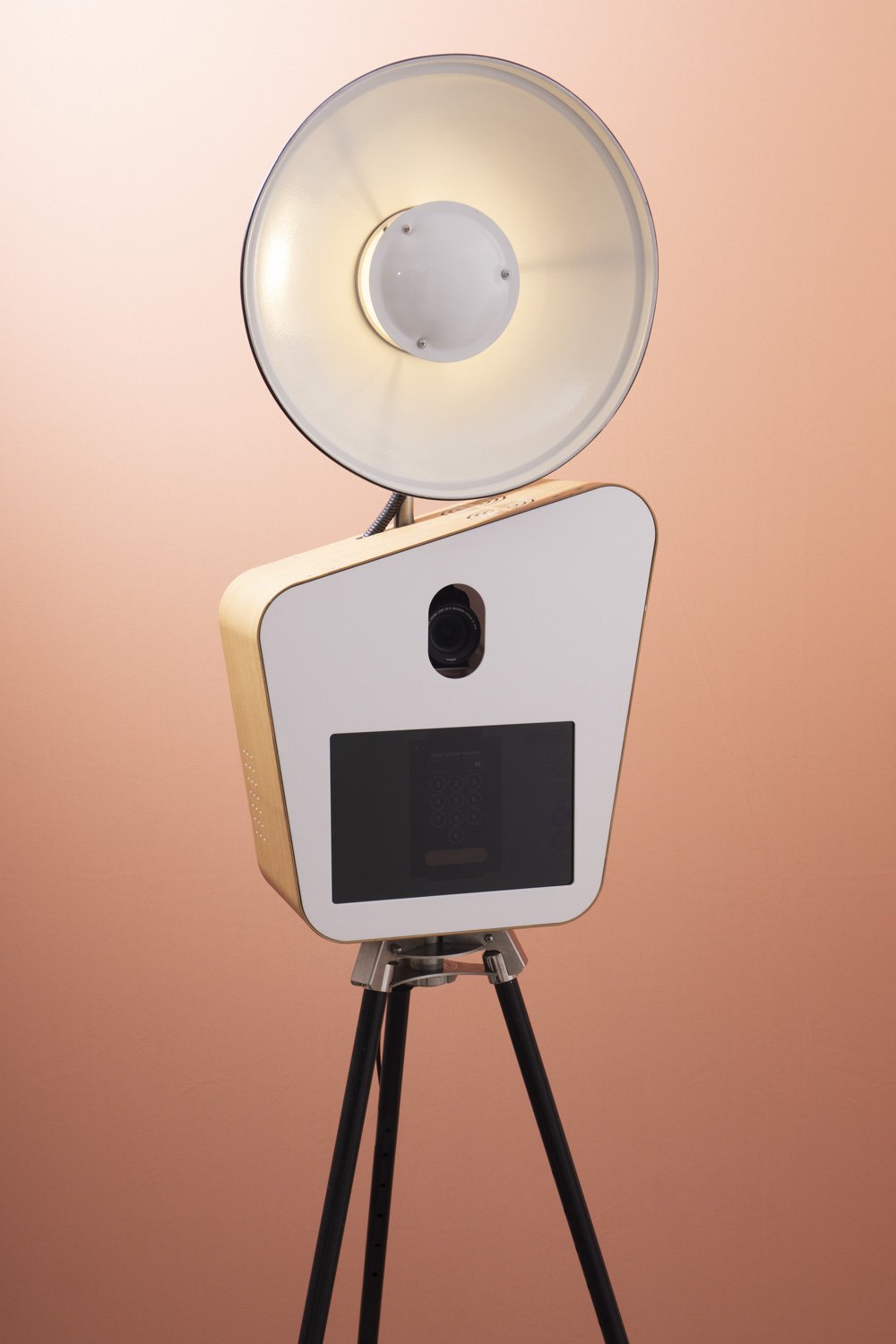 Photo Corner open style retro photo booth hire Sydney product shot on plain background showing touch screen and studio lighting.