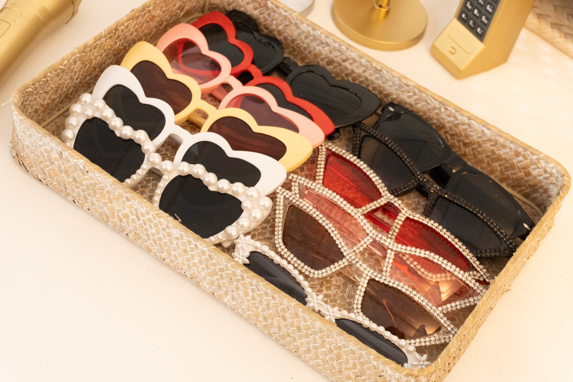 Collection of stylish sunglasses included with Photo Corner photo booth hire.