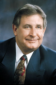 Ralph Klein, Premier of Alberta, via Canadian Encyclopedia .
