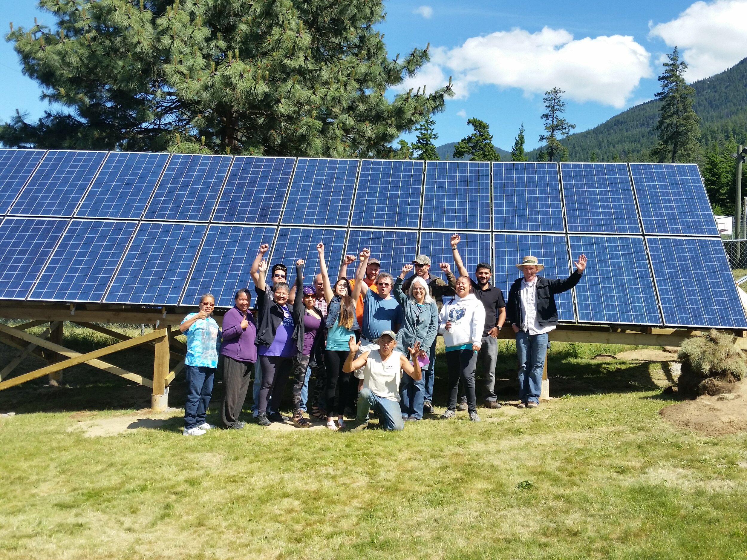 Group of People Beside Solar Panel