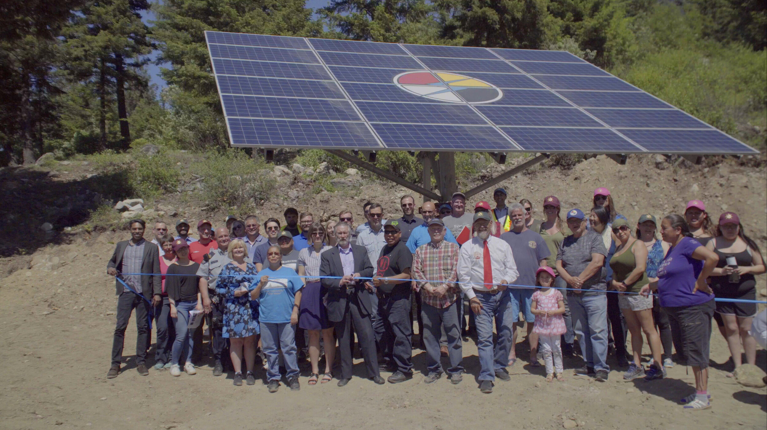 Group of People Standing Near Solar Panel