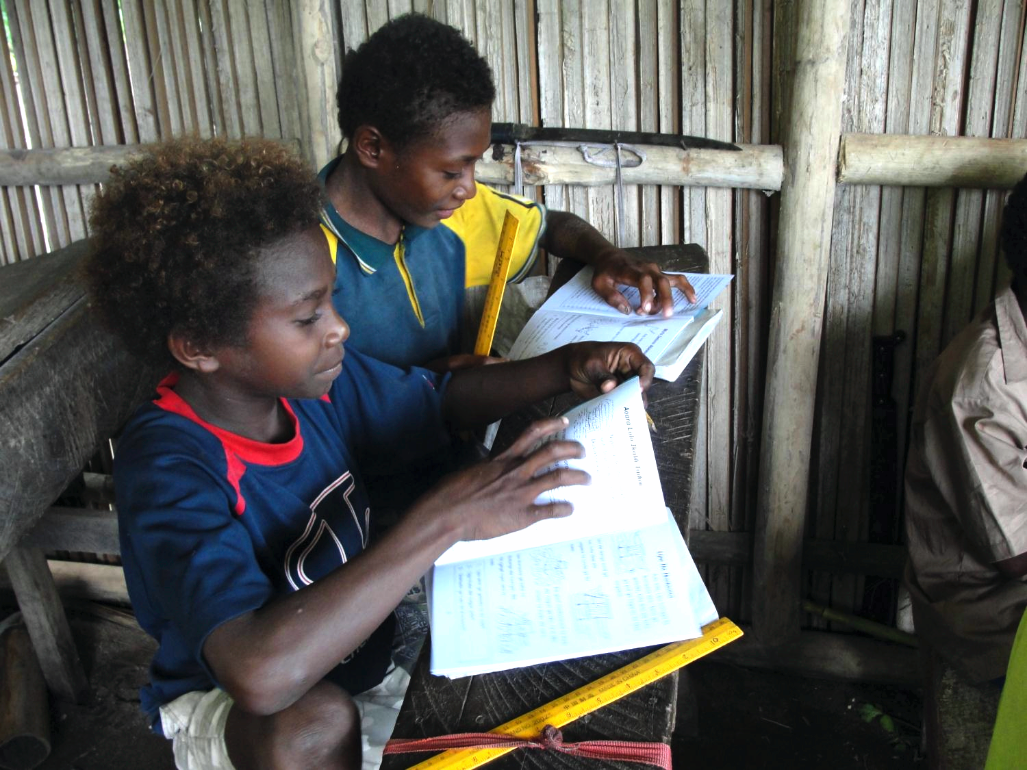 Students reading Bloom books