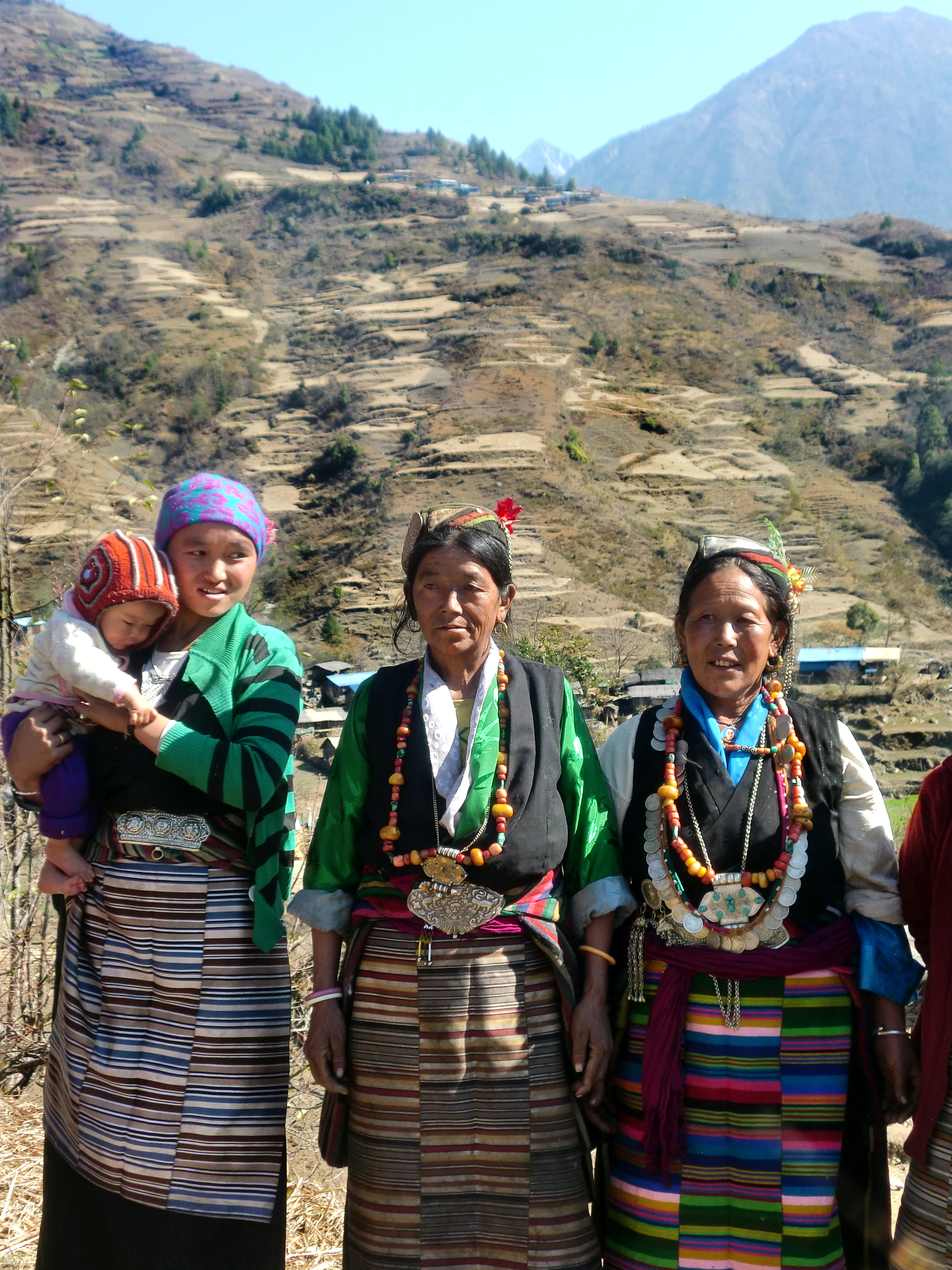 Three lovely Lhomi women wearing their tradition dress. 