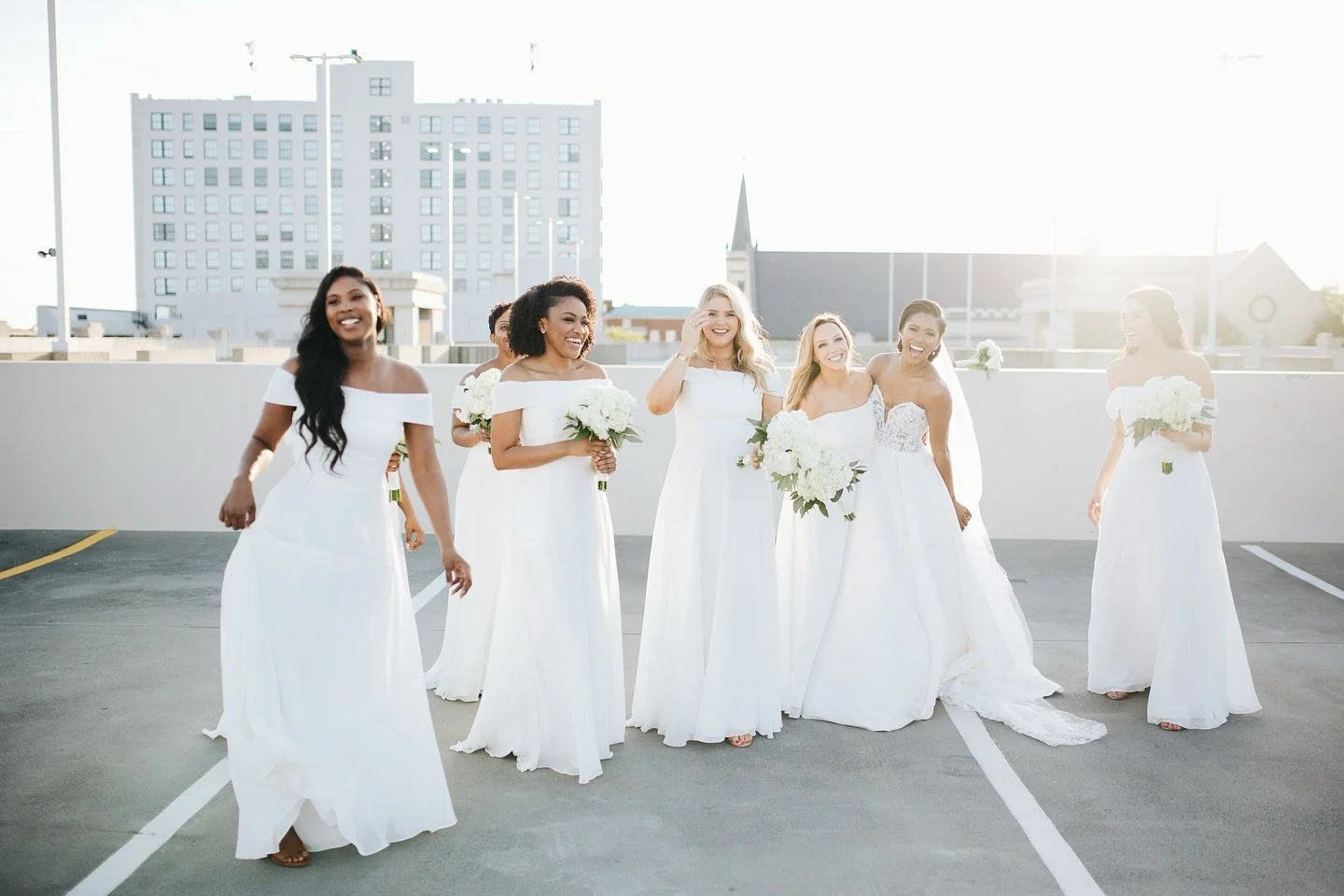 Who says a parking deck can&rsquo;t be the perfect backdrop for wedding portraits?! @dajadavidson &amp; @cjdavidson21 can make any any background look KILLER! ✨