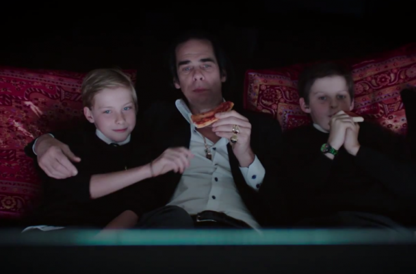 Nick Cave eats pizza with his sons while watching Scarface in 20,000 Days on Earth .