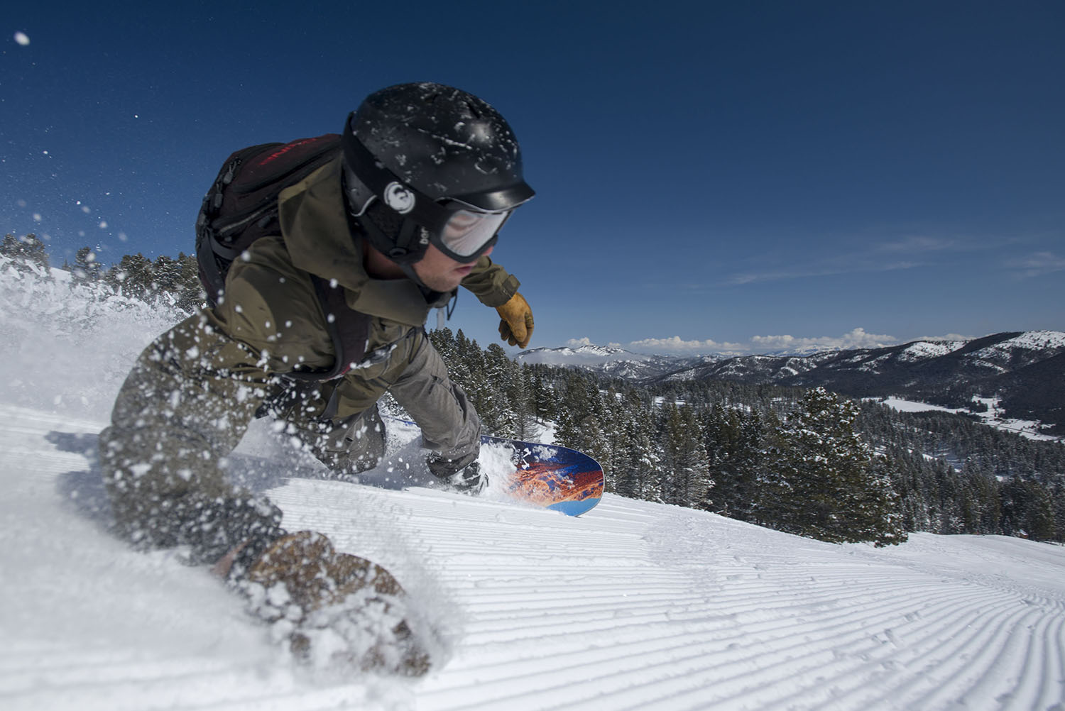If the corduroy fits, shred it.  Kyle Cremer stitches the fabric at Bridger Bowl.