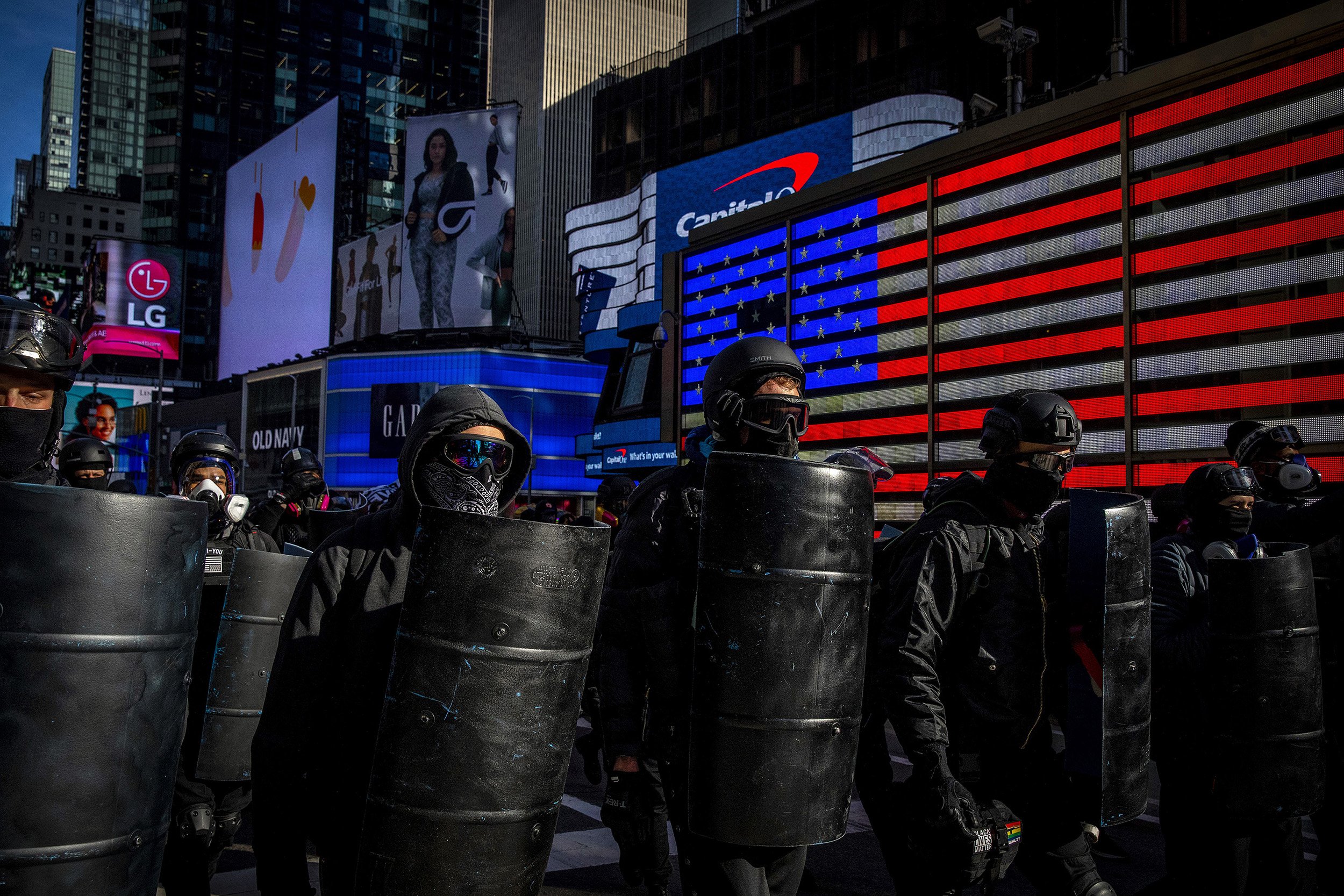  Anti-fascist demonstrators march through Times Square days after a mob of Trump supporters stormed the U.S. Capitol. New York, NY 