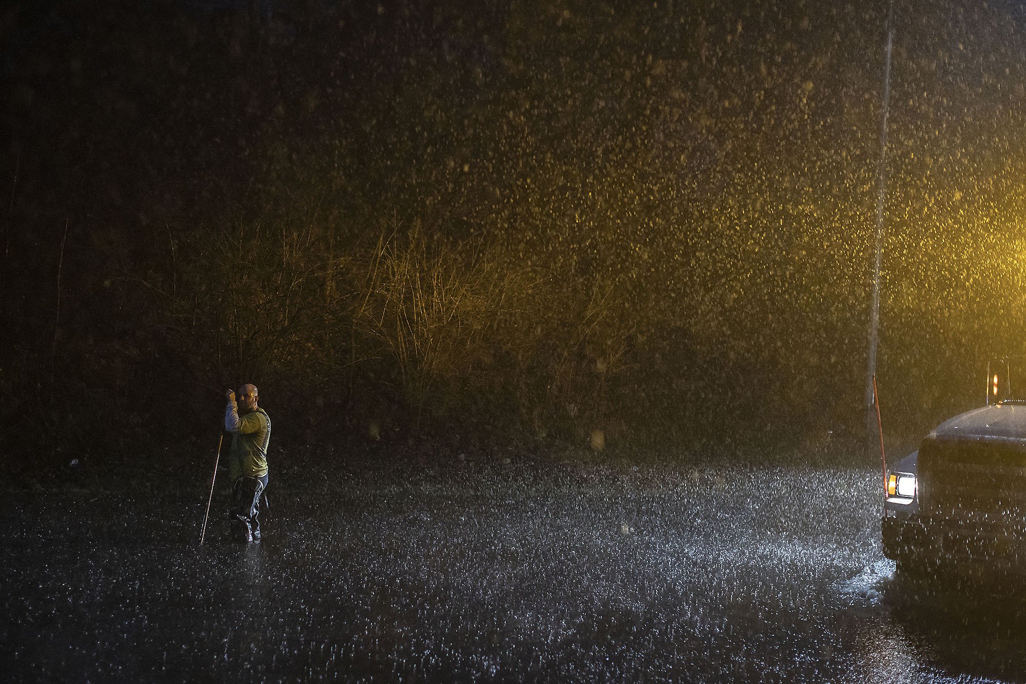  A worker tries to clear pre-dawn flash flooding. Bronx, NY  