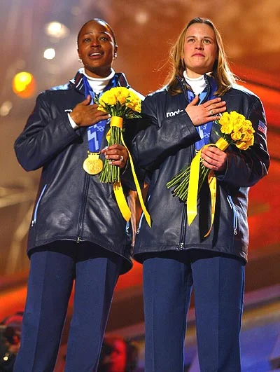 Vonetta Flowers with Jill on the medal stand in Salt Lake City