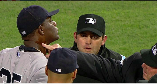 New York Yankees pitcher Michael Pineda being inspected by umpires at Fenway Park on April 23, 2014 in the 2nd inning. He was ejected from the game and on April 24, he was suspended by MLB for 10 games. The same night that the US Women's Olympic Hockey team members were to be honored by the Sox.