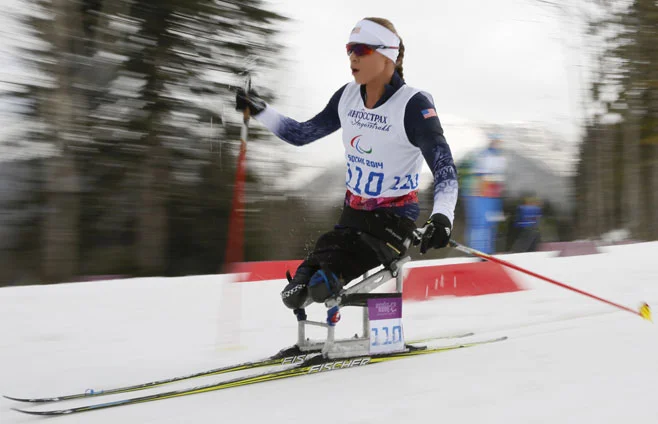 Courtesy (AP Photo) Oksana in action at the 2014 Paralympic Games in Sochi.