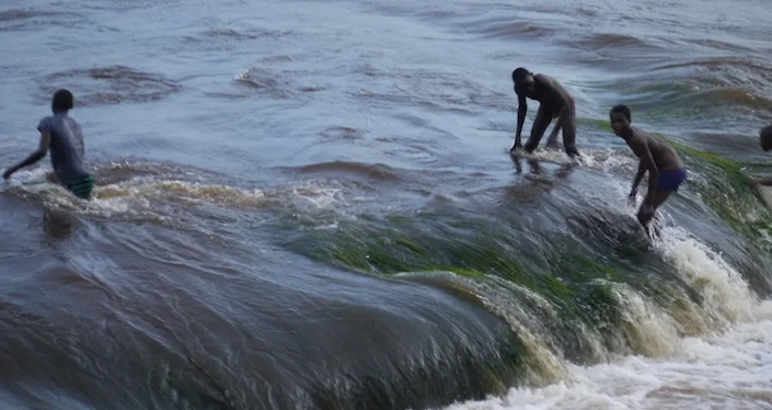 Boys enjoying a swim in the Congo River (photo by Bill Laurance)