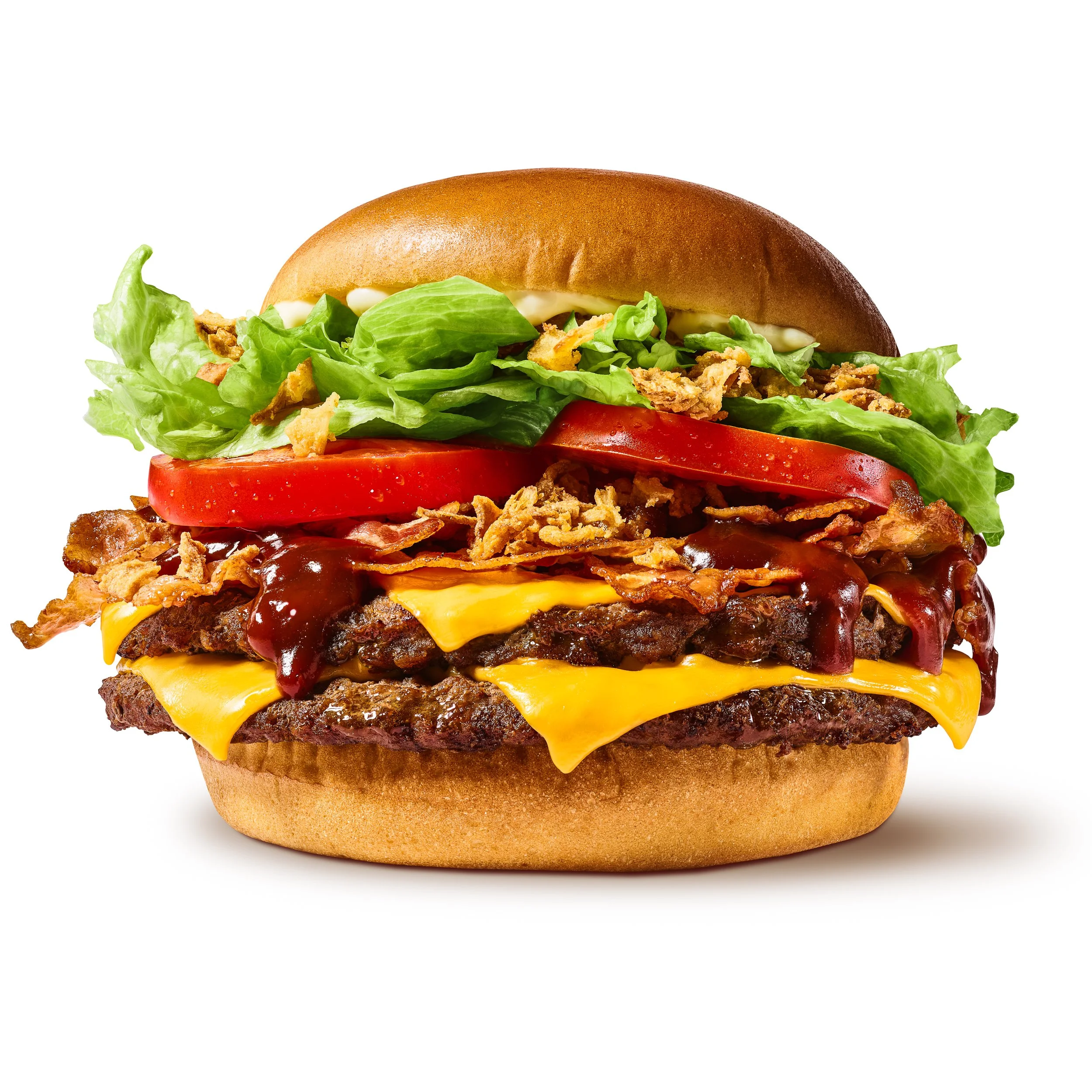 Fotografia produktowa burgera Burger King – profesjonalny packshot reklamowy wykonany przez Piotra Haltofa w YOUME STUDIO. Food styling: Dominika Haltof. High-end retusz, precyzyjne szparowanie i postprodukcja do kampanii reklamowej.