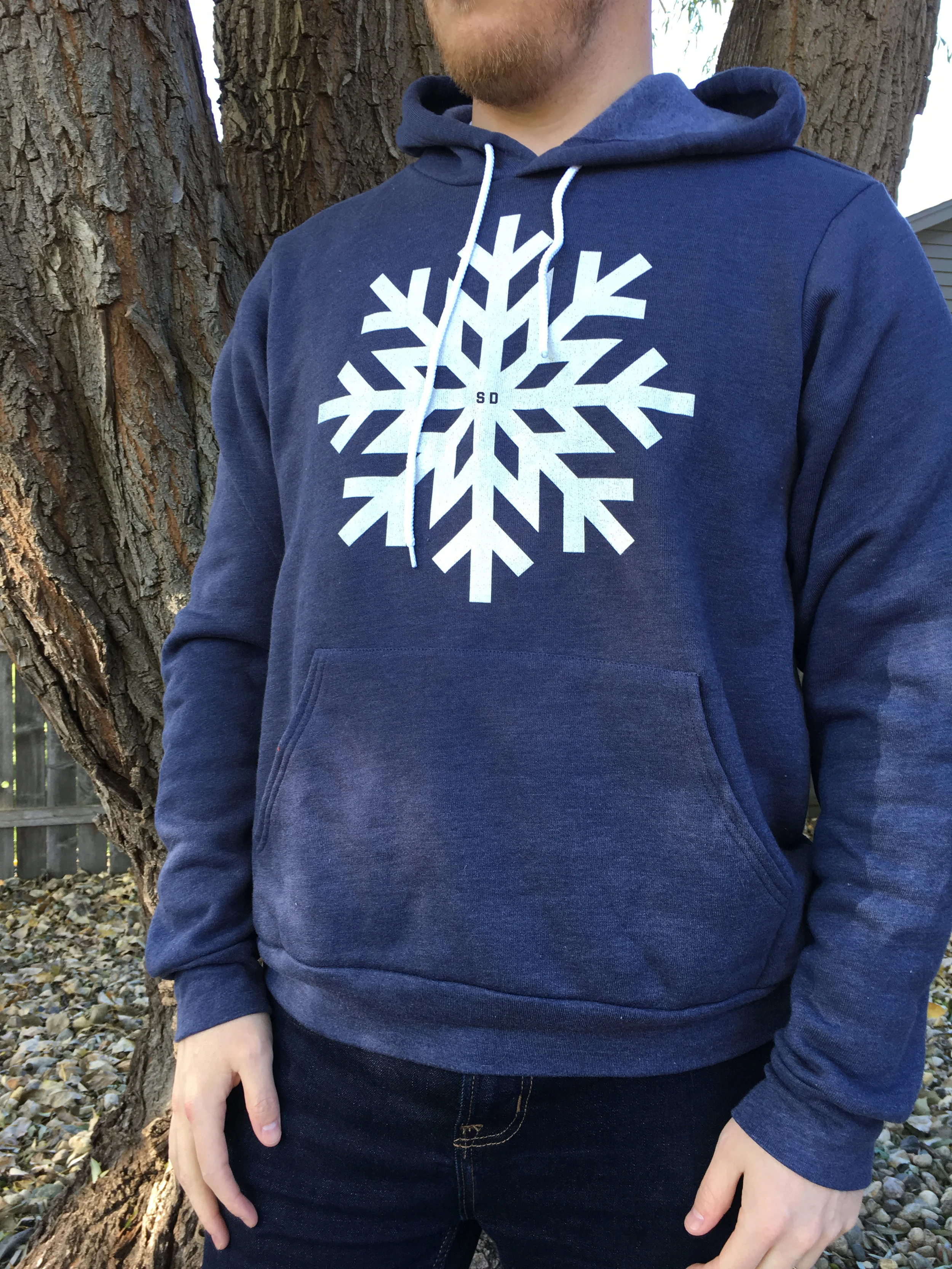 Snowflake hoodie in navy on male model