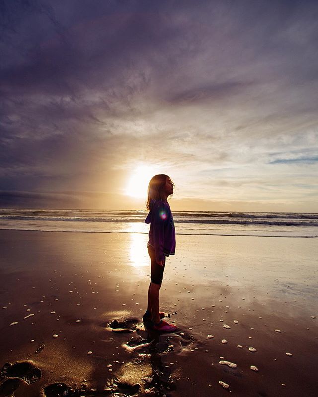 My daughter paused and looked off majestically for a split second in between spazzing out and having a blast on the beach. I love her ❤️