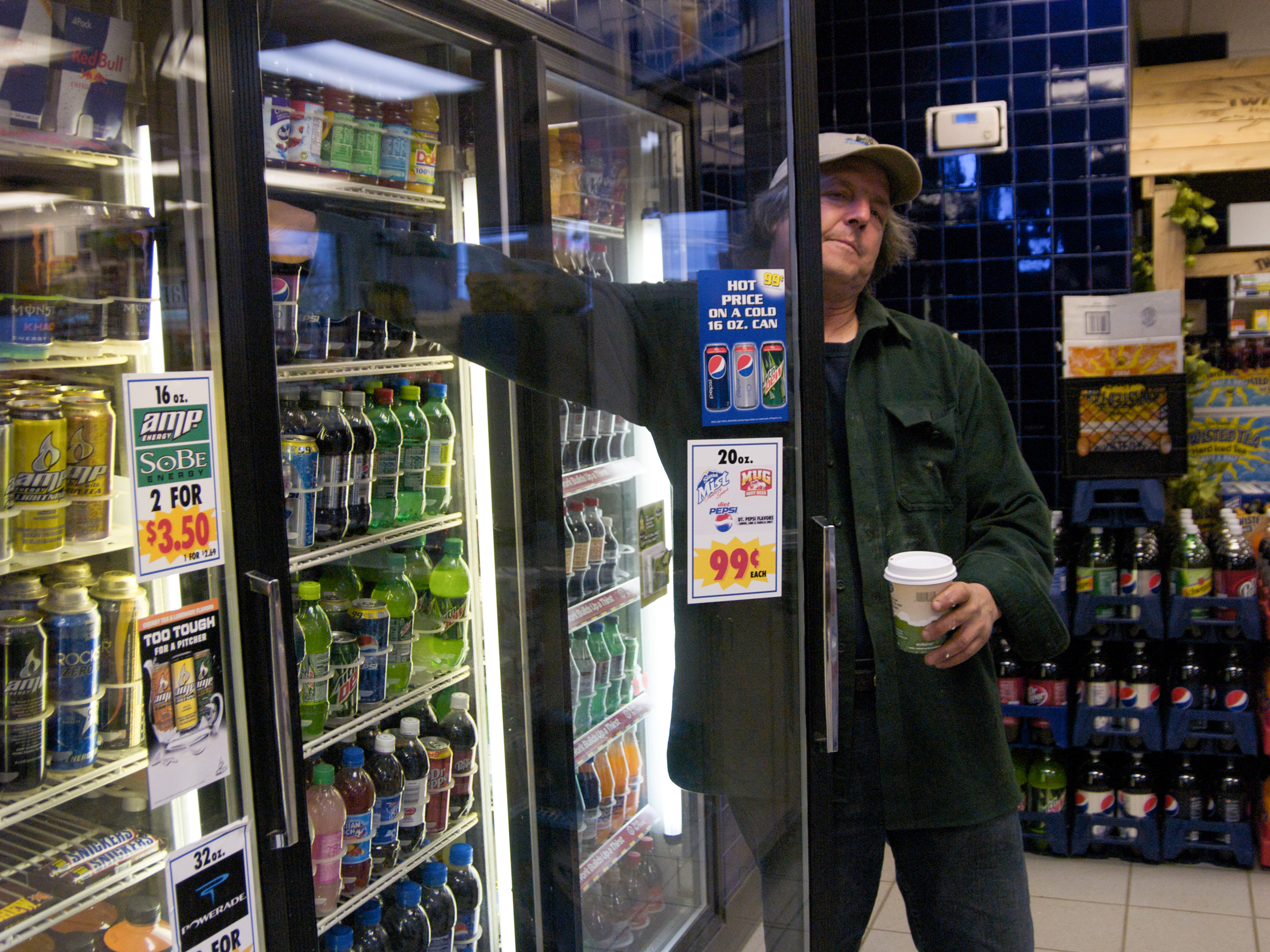  (04/18/09)&nbsp;On his way to the dock, Carter Newell stops in at a local gas station for a cup of coffee and a soda. He has about eight or nine hours of hard work ahead of him. 