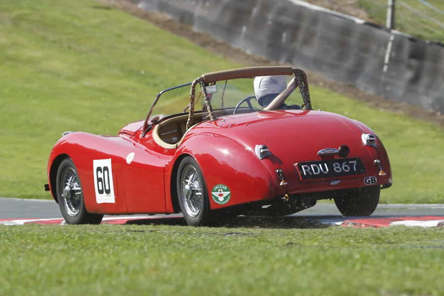 Tailpiece, literally! - Geoff Ottley in his Jaguar XK120 on his way to 5th, having driven it up from Dorset. Magnificent effort! Photo - Mick Walker