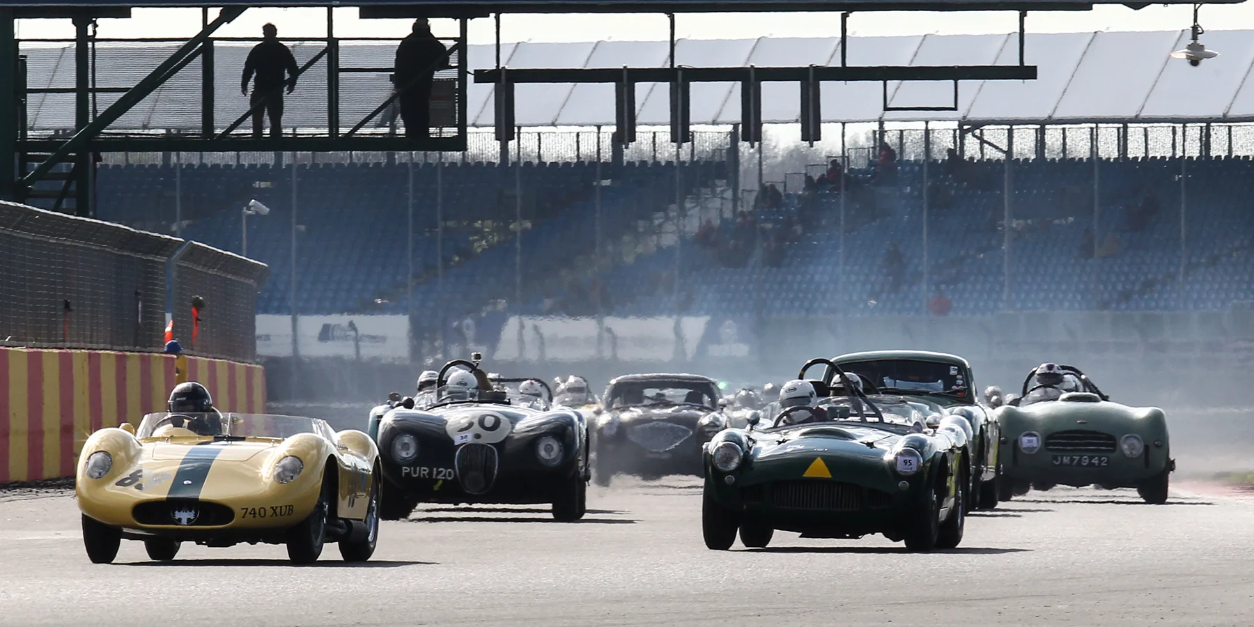 Exhaust haze rises above the grid as 29 cars get off the line. Photo - Richard Styles 