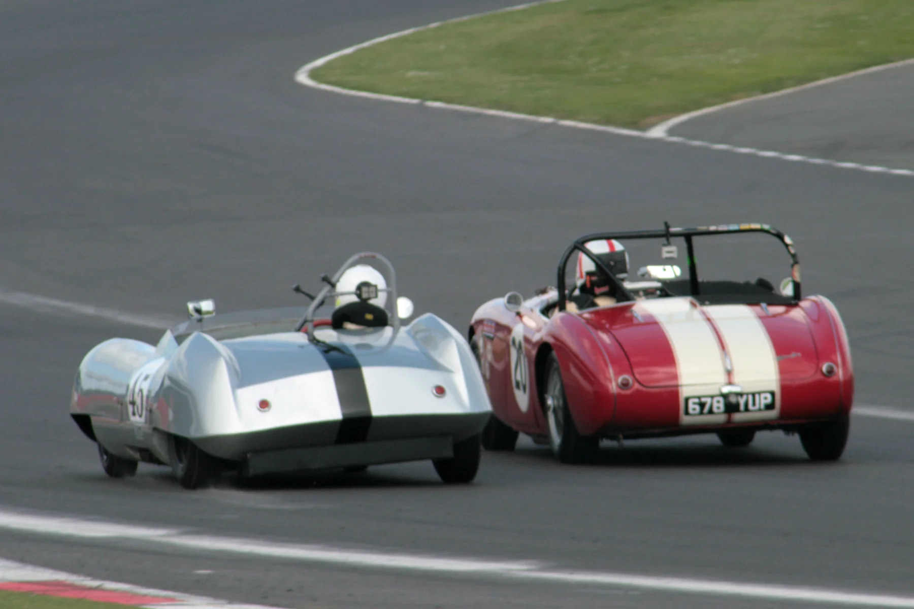Not the best of shots but it does illustrate the terrific battle between a FLIER (Rod Begbie in the Elva MkIV) and an Inter-Marque car (Jonathan Abecassis). The Austin Healey faster down the straights but the Elva better through the corners. The great dice sadly came to an end with power loss and retirement for the Elva. Jonathan went on to finish 14th. They both have in car footage - well worth a look:- https://www.youtube.com/watch?v=onBWTzgoAkw http://www.youtube.com/watch?v=M7urNPOPLdY&app=desktop