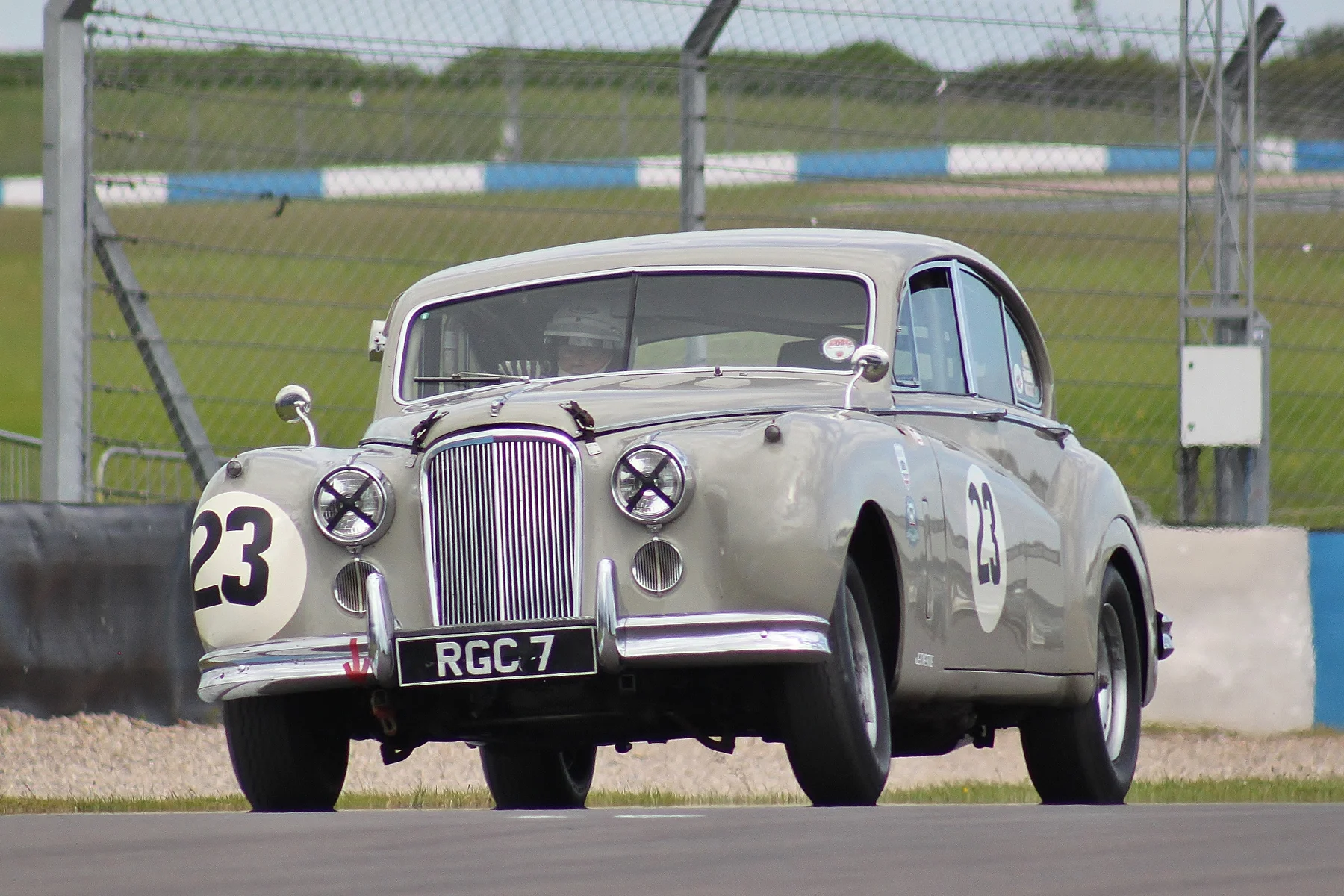 Not an Inter-Marque car since it is neither a GT nor a sports car but nevertheless a very impressive presence in the absence of the XK150. Big MkVII of Graham Love displaying substantial camber angle. Photo - Bob Bull