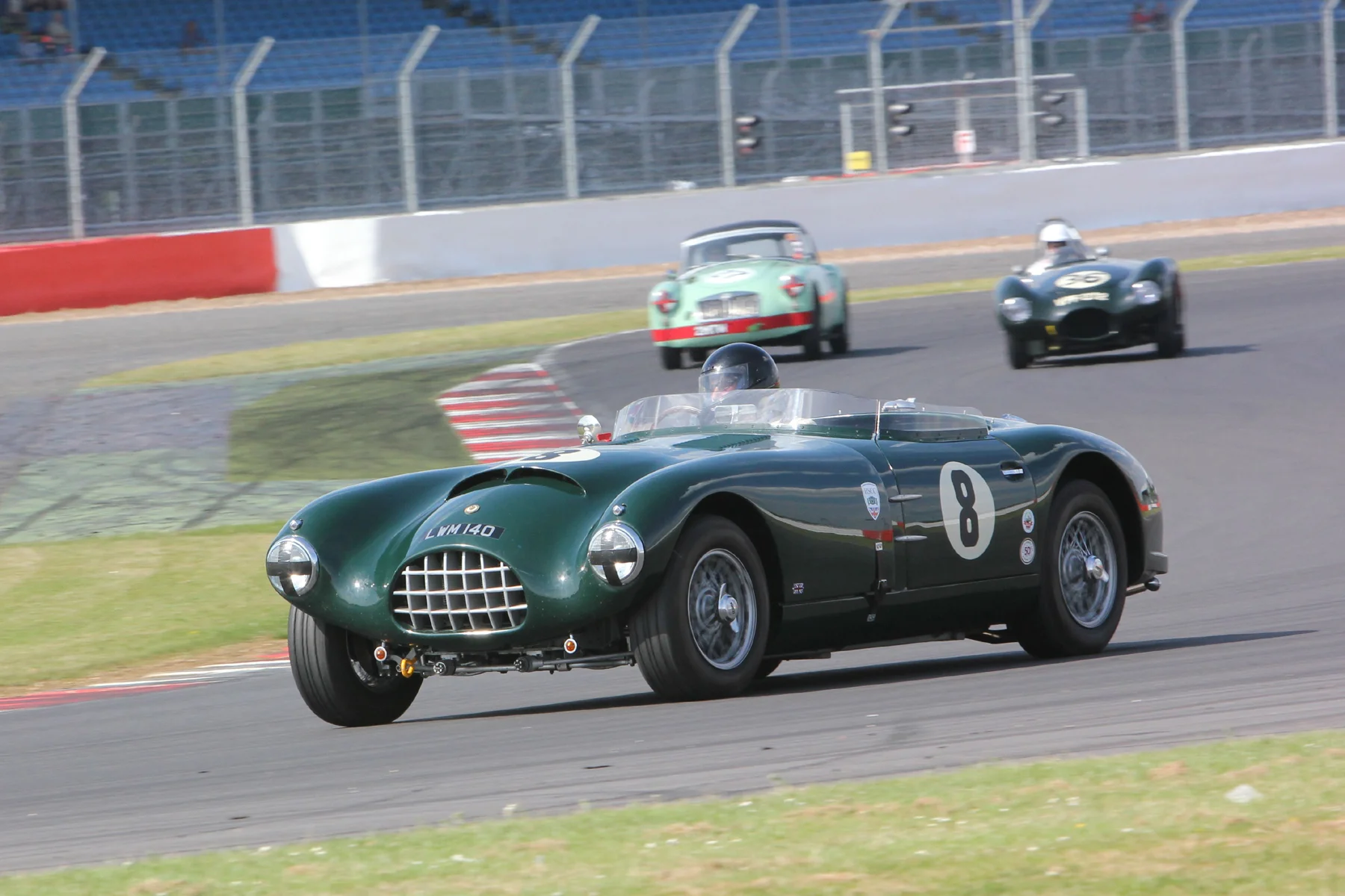 Charles Fripp (Gomm Jaguar) runs ahead of Paul Griffin (Connaught ALSR) and Roger Daniell (MGA Twin Cam) Photo - Pat Arculus 