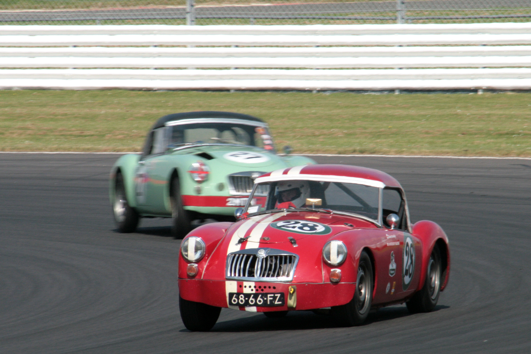 Shaun Bromley holds off Roger Daniell in their splendid MGA duel to the finishing line. Photo - John Turner