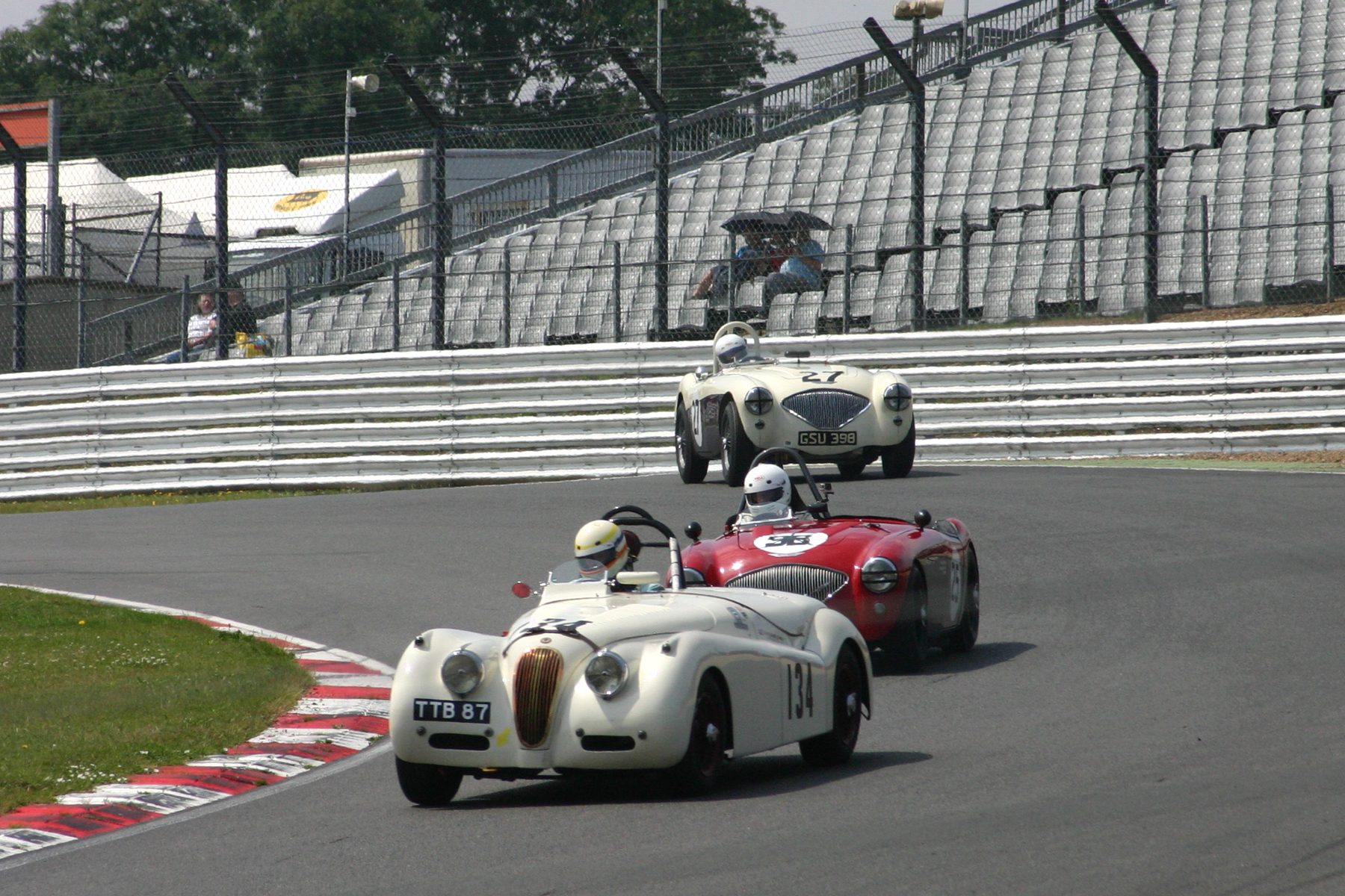 Paddock Hill Bend. Messrs Scholey, Matthews and Grice were still this close at the finish and in this order Photo - Jonathan Abecassis 