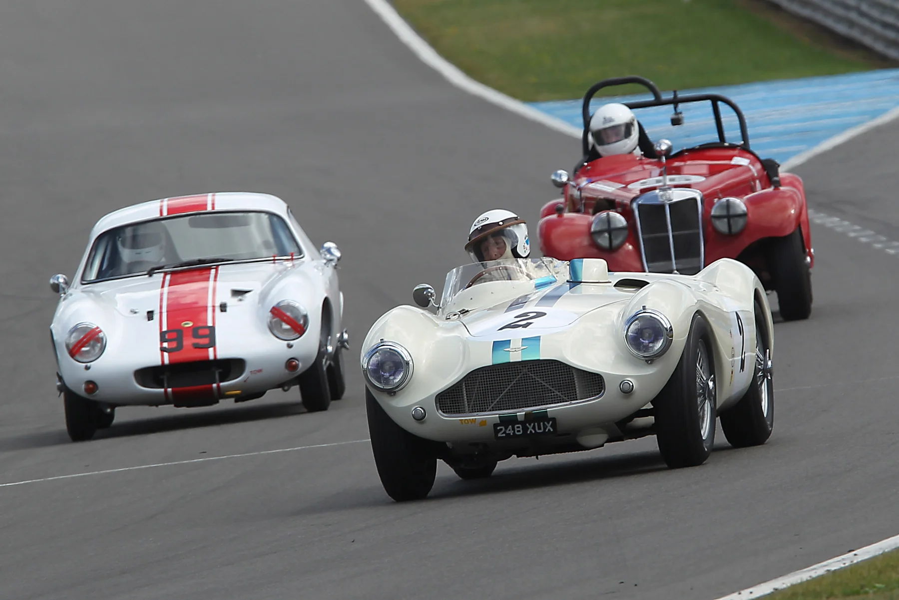 David Bennett took the Aston Martin DB3S to 8th. Here he leads John Waterson's Lotus Elite and Charles Harmers MG TF which later retired. A classic illustration of the variety of shape and development of sports cars during the 1950s. Photo - Mick Walker 