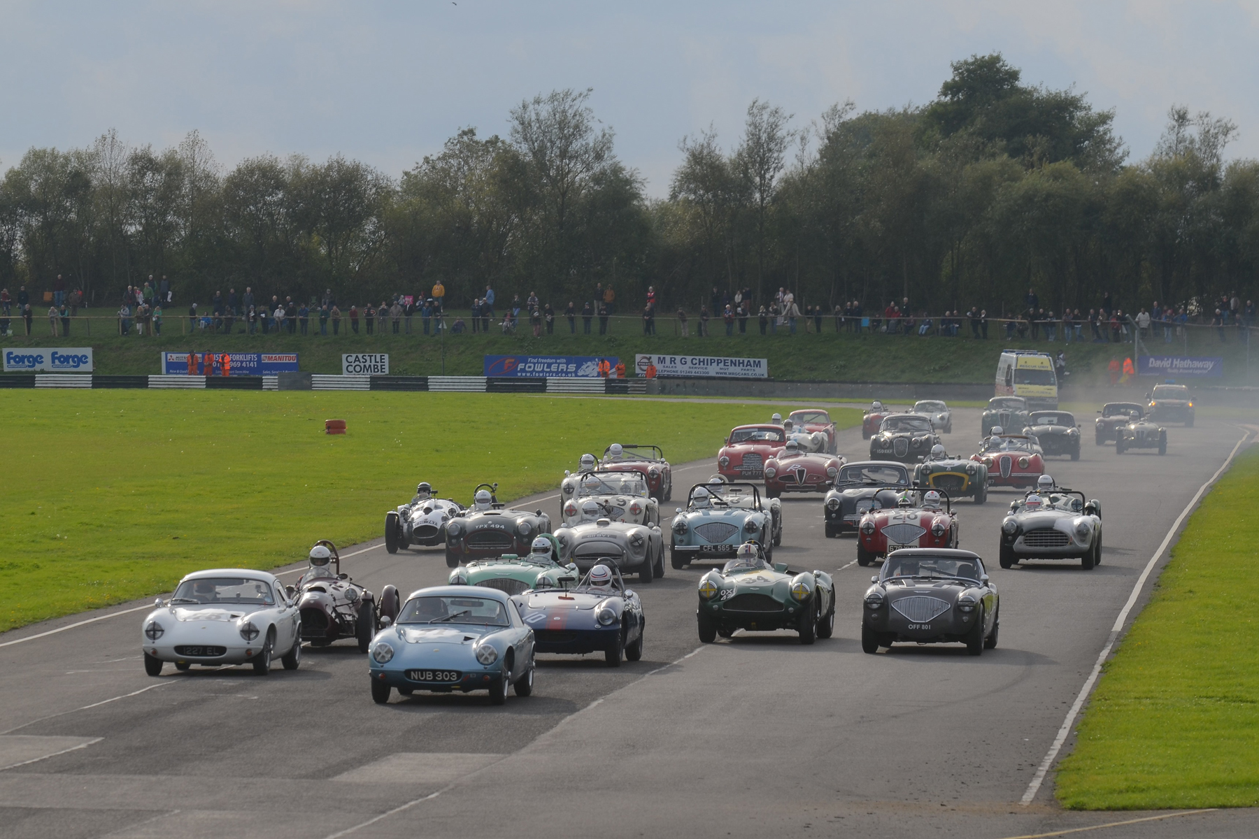 A grid that would grace any meeting - yes, even Goodwood Revival or Silverstone Classic. Brian Arculus gets the jump on poleman Robin Ellis whilst Simon Hadfield (Elva) and John Ure (Cooper Bristol) burst through from the third row but best start of all is surely Mike Thorne in the Austin Healey from the 4th row! Photo - Ollie Read