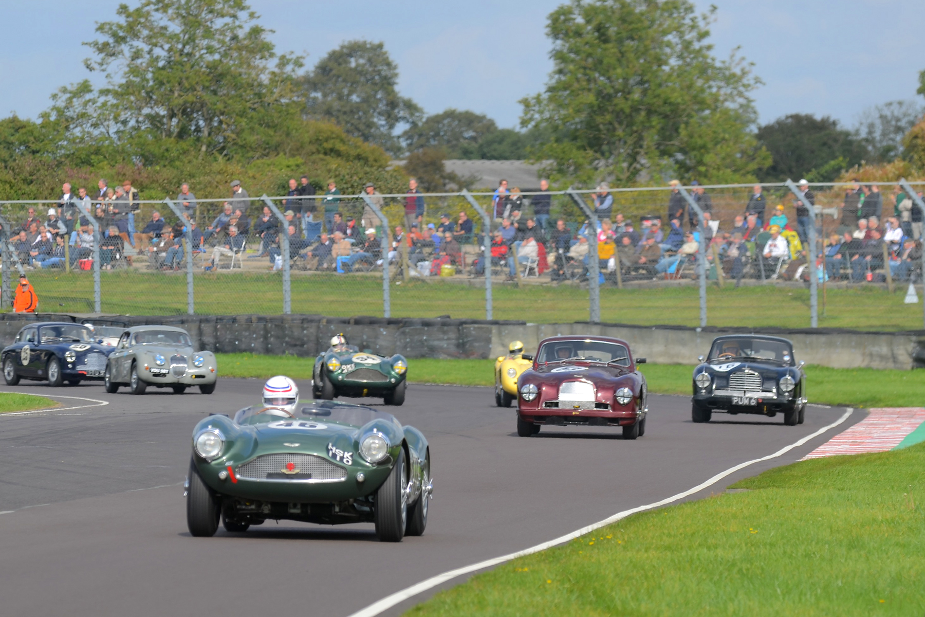 First lap and Simon Hadfield has already established a gap, whilst Steve Boultbee-Brooks has dropped to 5th behind David Reed, Chris Jolly and Steve McCulloch. Note the XK150 of Paul De Havilland in the background who featured heavily in the battle for second, and just coming into shot, Nick Ruddell in his DB2/4 Mk1, Photo - Ollie Read