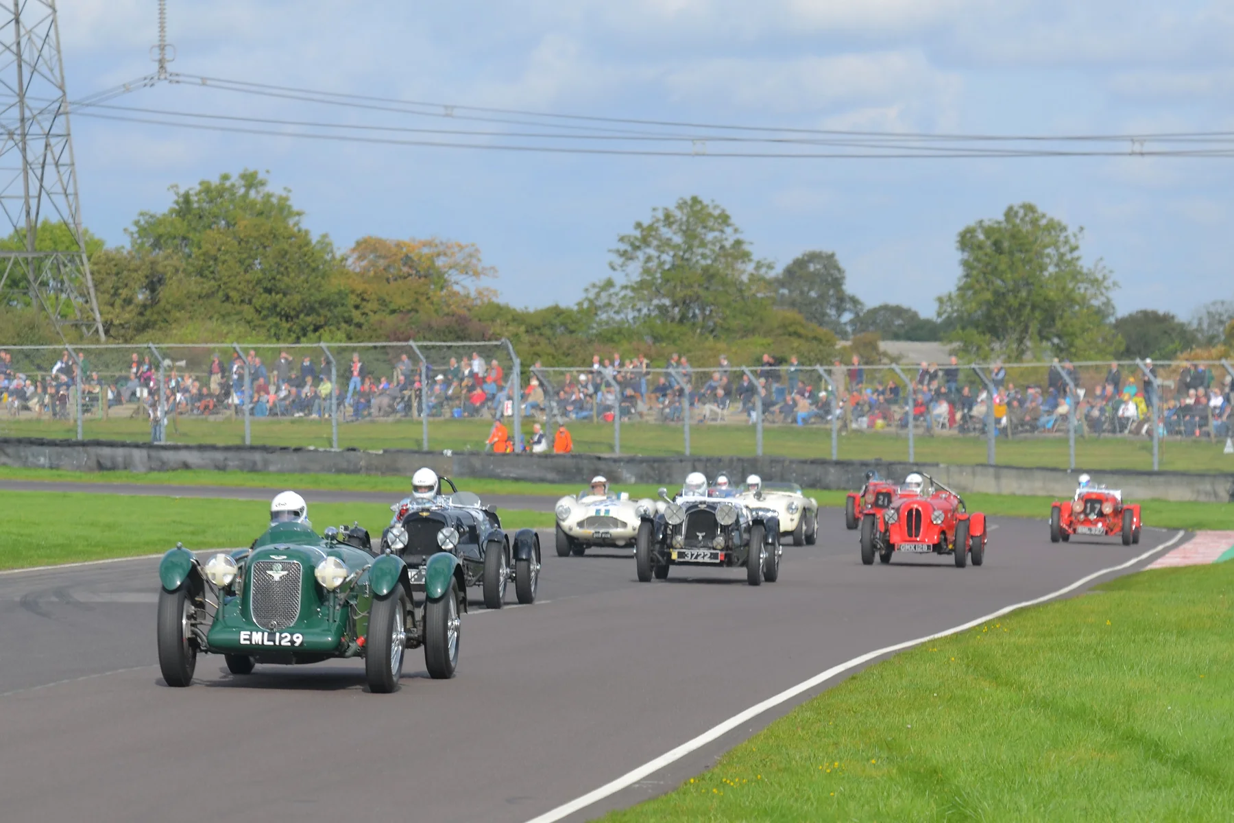 Further back but still on first lap, David Freeman leads the prewar Astons and a few of the postwar cars. The leading 1500cc Aston at this point is car 17 (Ulster LM17) in the hands of Holly Mason-Franchitti (far right) Photo - Ollie Read